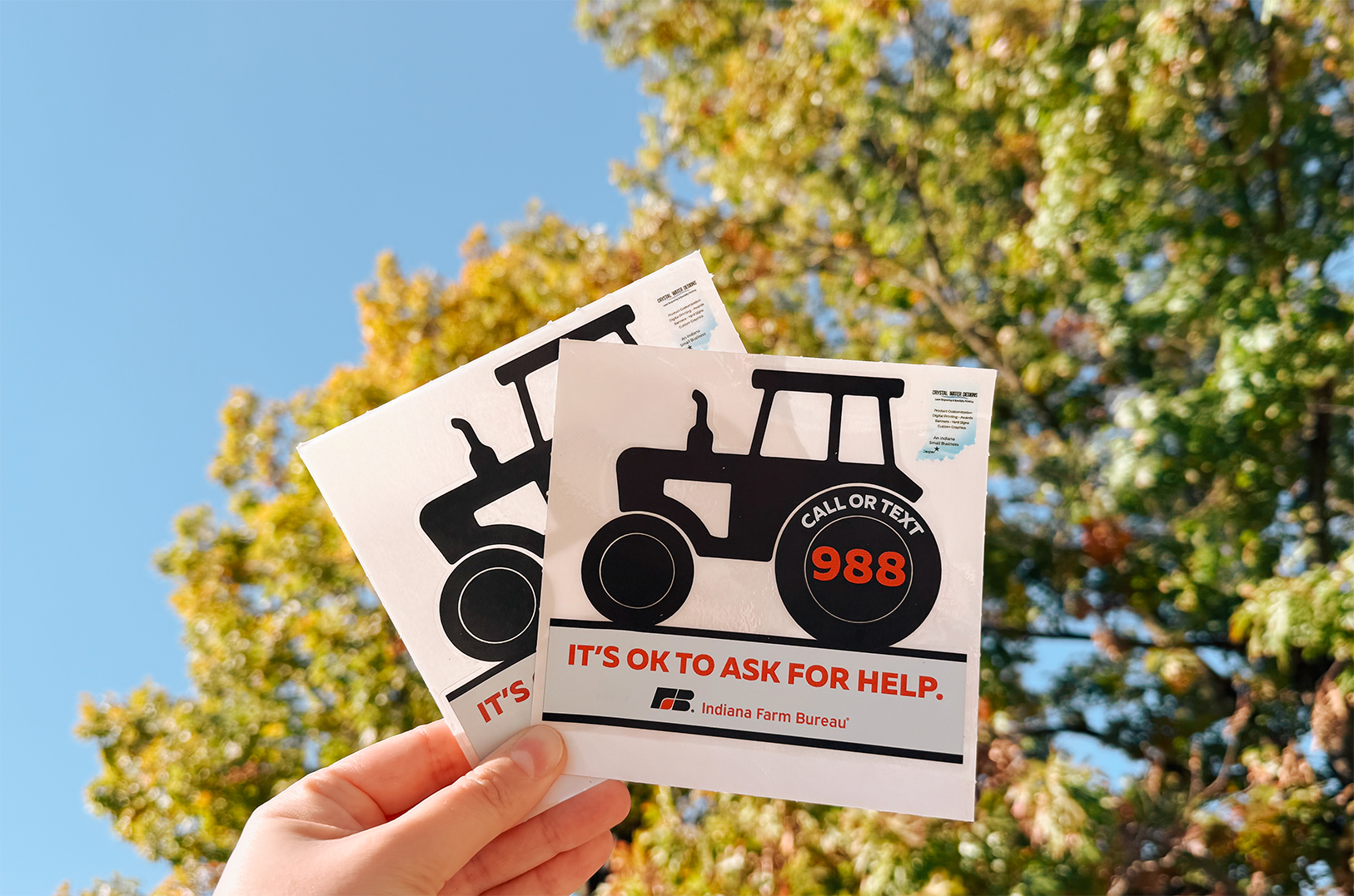 Sticker with a tractor and the text 