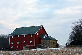 Farm bill_Red barn in winter