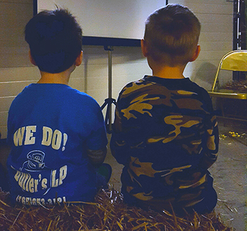 Ag Day Photos_Two boys on hay bale